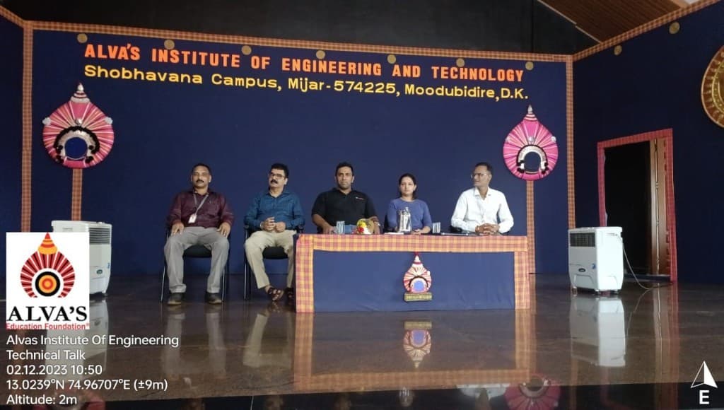 Panel seated on stage at Alva's technical talk