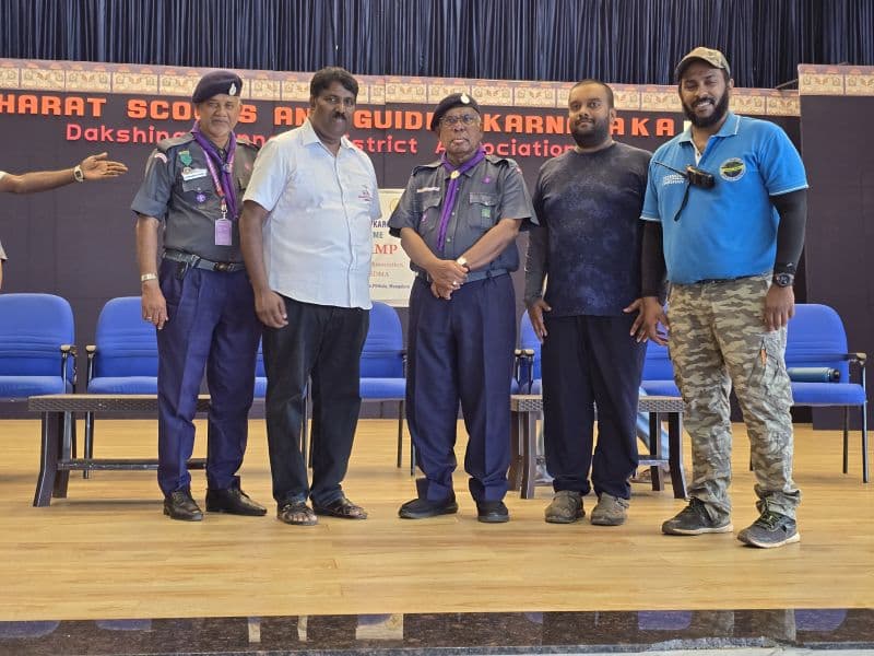 Group on stage with Bharat Scouts and Guides Karnataka district banner